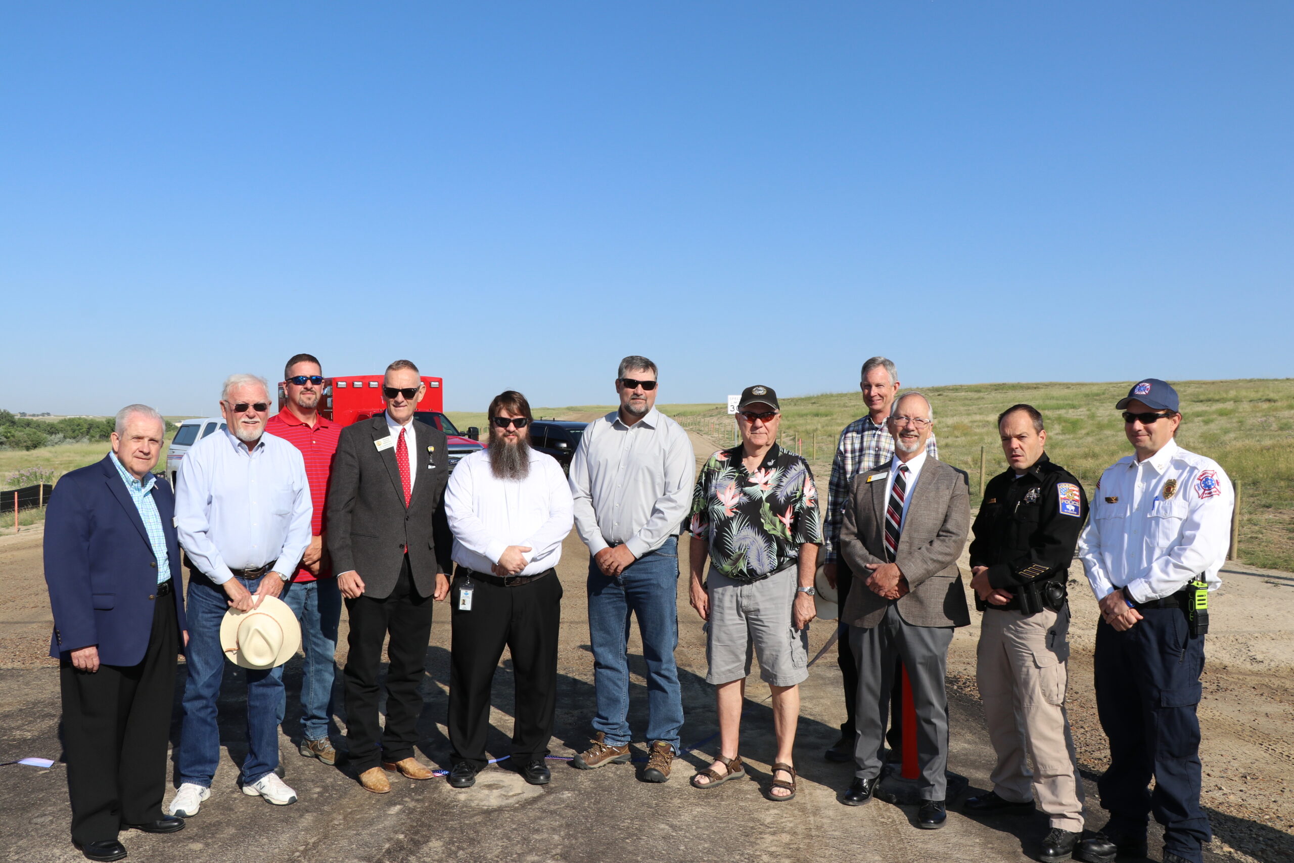 stakeholders at evansville secondary access road ribbon cutting