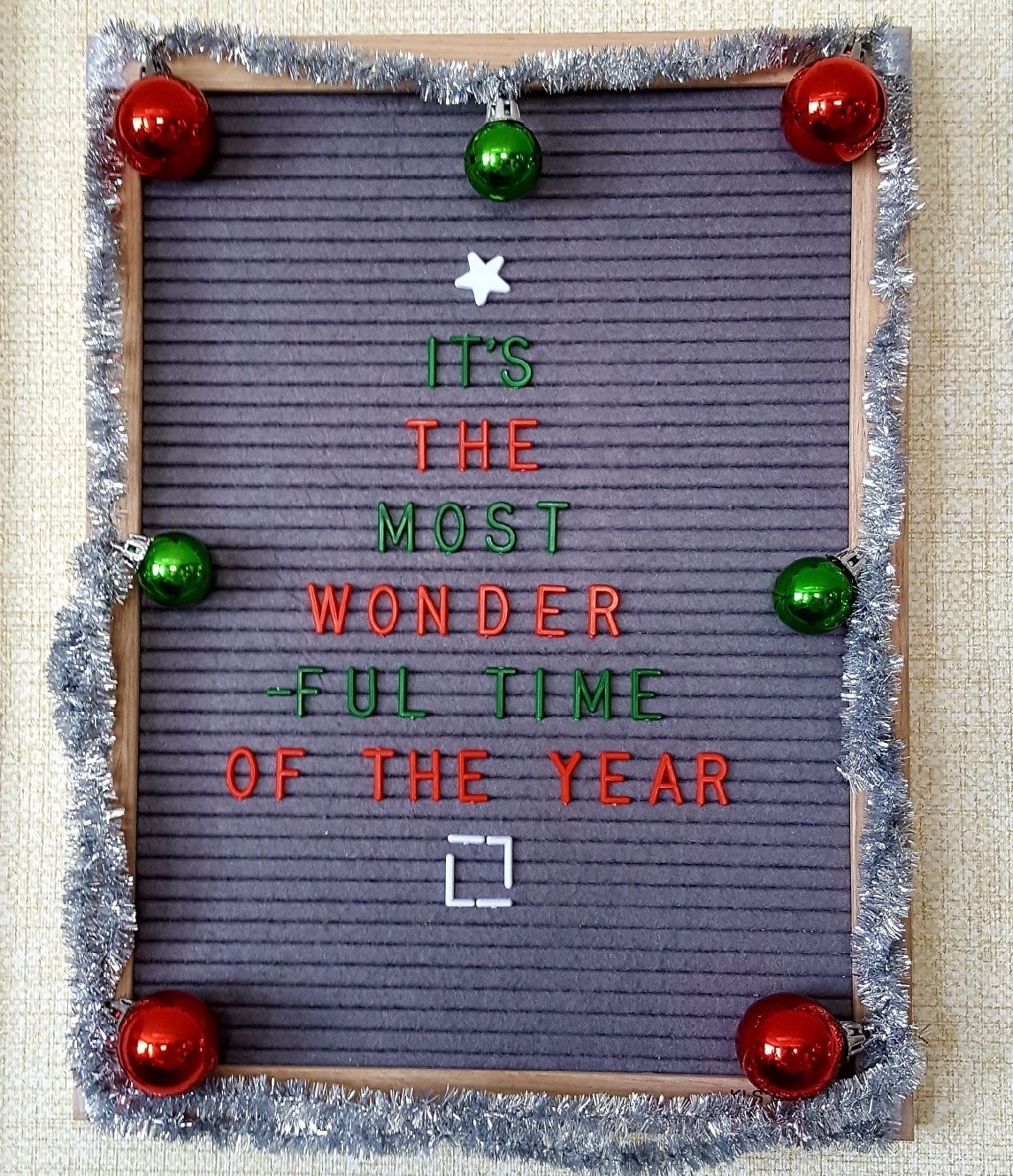Photo of letter board spelling "it;s the most wonderful time of the year"